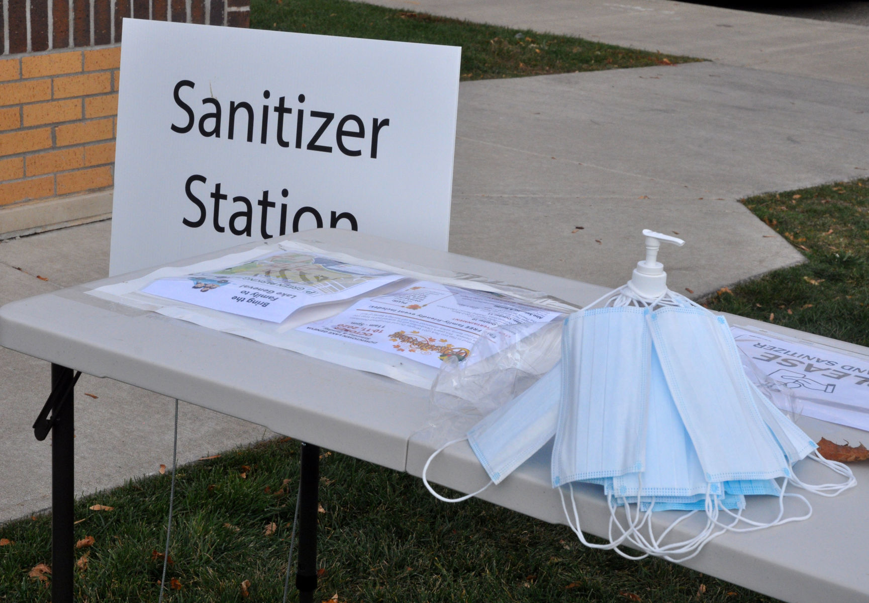 Hand sanitizer stations and face masks